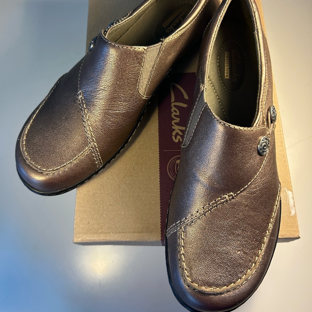 Clarks gold metallic slip on